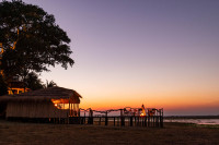 The dining area and extended walkway offer a majestic view of the remarkable plains, while a campfire extends warmth in the chilled nights after supper and fresh mornings to watch the sunrise as the herds of lechwe graze. 