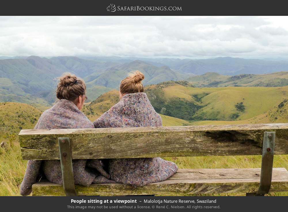 People sitting at a viewpoint in Malolotja Nature Reserve, Eswatini