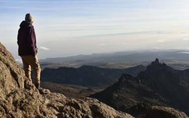 Hiker on the footslopes of Mt Kenya
