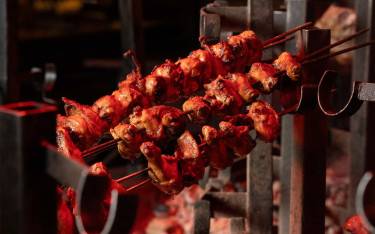 Meat on the grill at Carnivore Restaurant