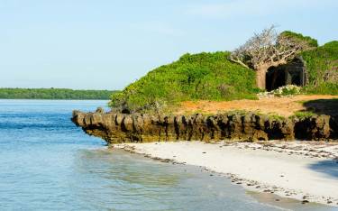 Sandy beach and coral outcrops in Turtle Bay