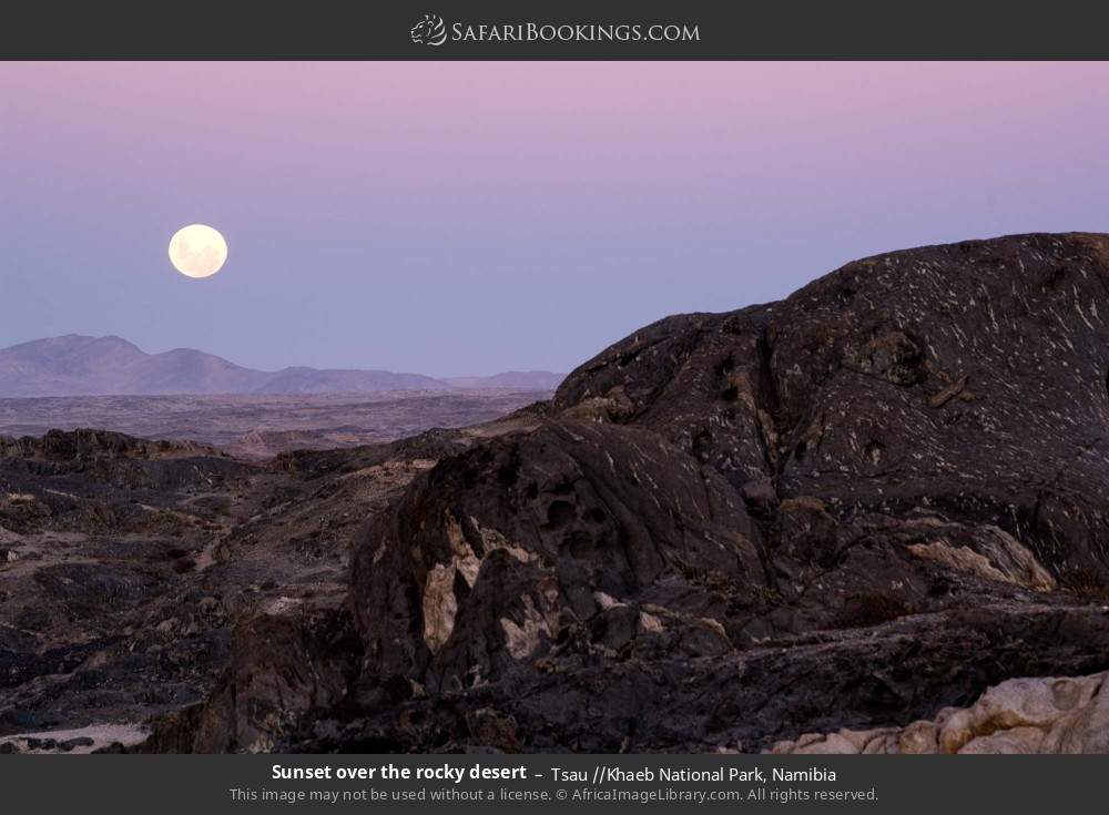 Full moon lighting up the rocky desert in Tsau //Khaeb National Park, Namibia