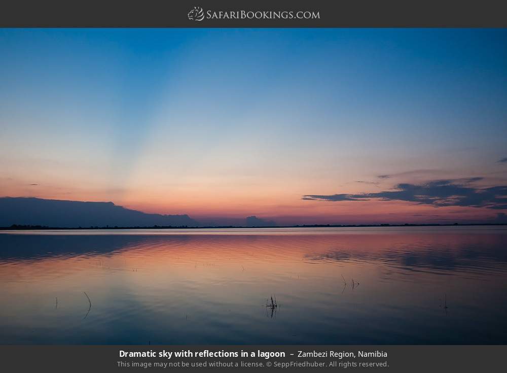 Dramatic sky with reflections in a lagoon in Zambezi Region, Namibia