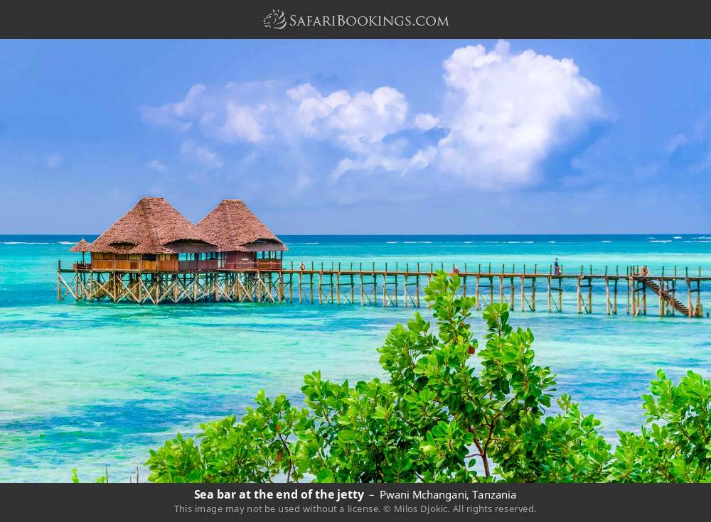 Jetty leading to an overwater bar at Pwani Mchangani in Pwani Mchangani, Tanzania