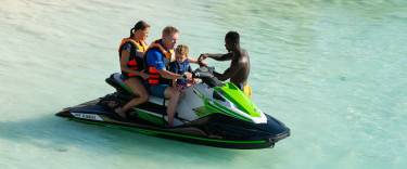 Family getting ready to take off on a jet ski