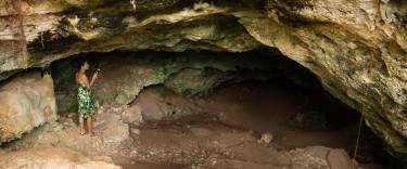 Visitor exploring Twin Caves