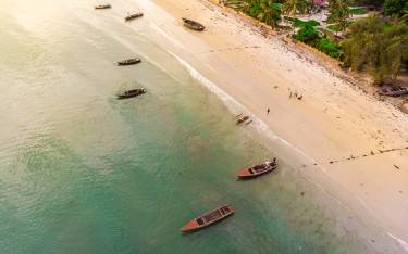 Thumbnail of Fishing boats at the beach