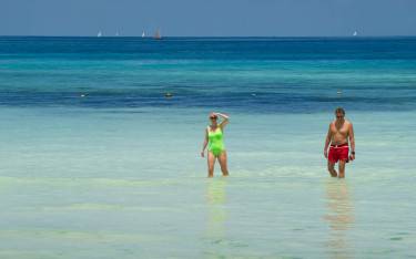 Thumbnail of People walking through the water