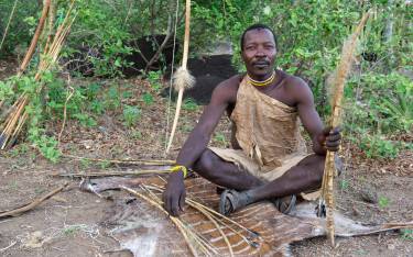 Hadzabe man with bow and arrow