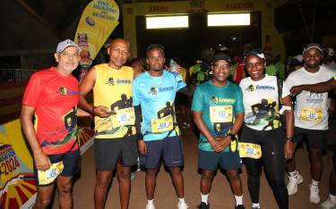 Participants posing for a photo at the start of the Kilimanjaro Marathon