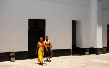 Women crossing the courtyard of St Joseph's Cathedral