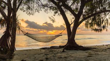 Hammock on a beach at Dar es Salaam at sunrise
