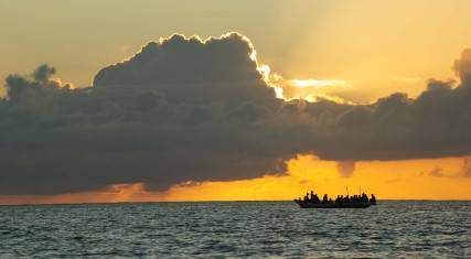 Fishing boat at sunrise